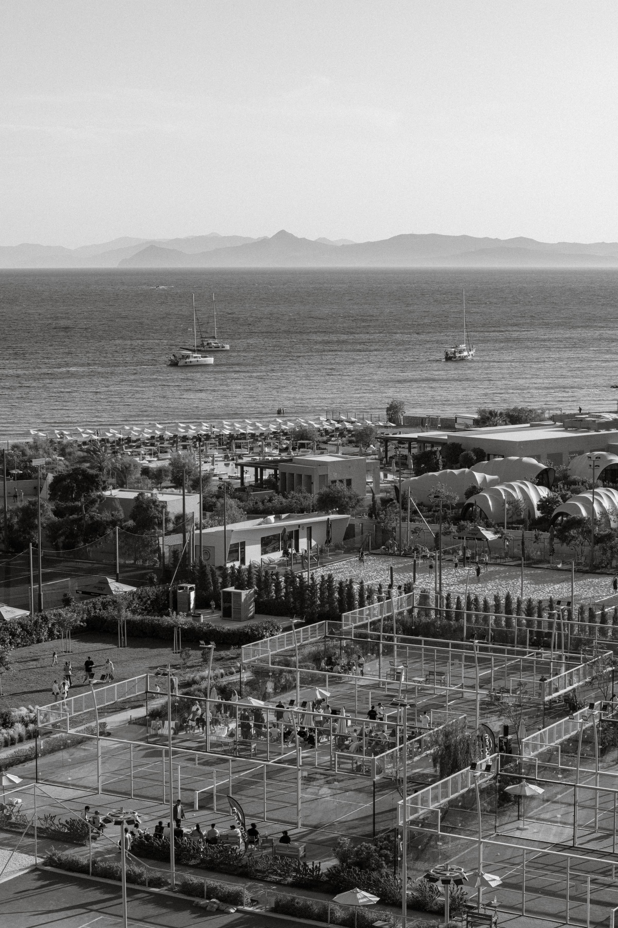 Ten Twenty Club and the sea at golden hour, from above